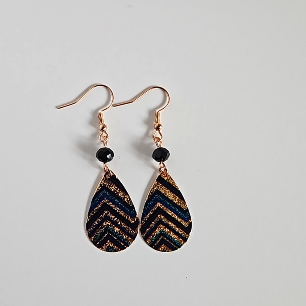 Handmade Gold earring with black and blue chevron pattern